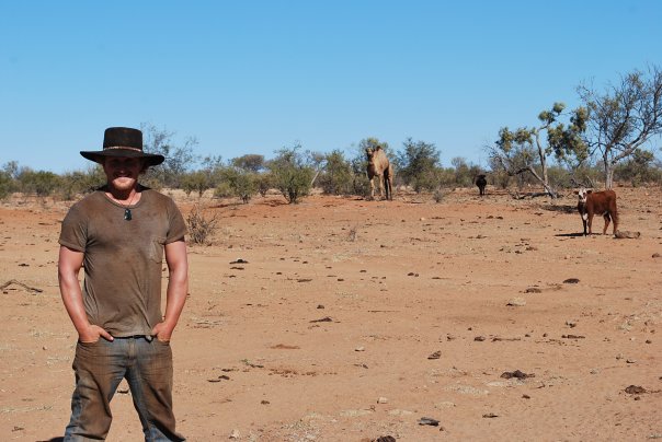 Nate tending cattle.